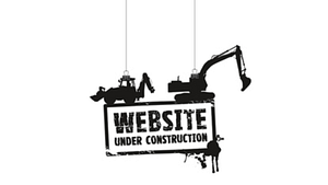A picture of 2 tractors and the words website under construction